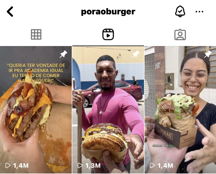 Perfil do Instagram @poraoburger mostrando reels fixados com 1,4M, 1,3M e 1,4M de visualizações